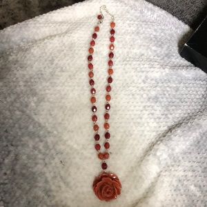 Coral colored rose pendant necklace